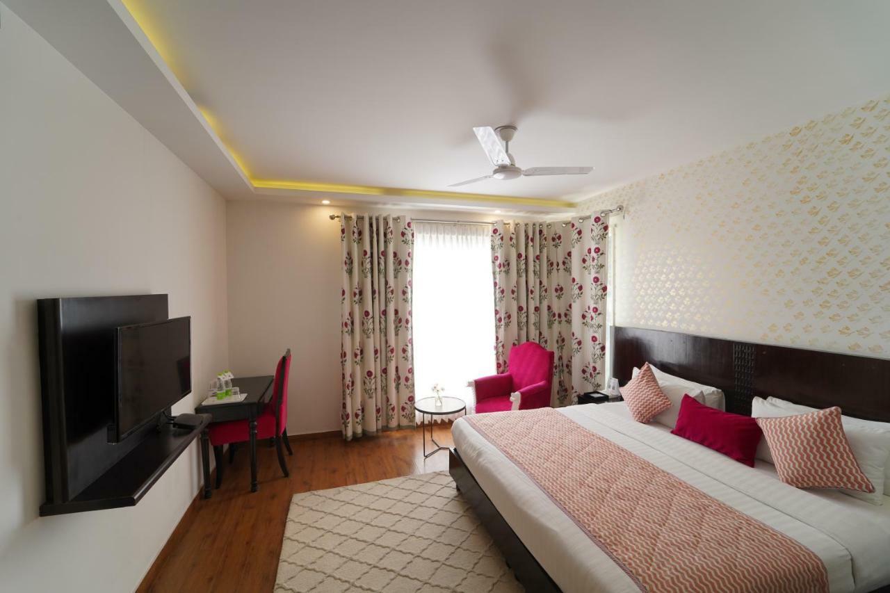 Rockland Hotel, C.R Park New Delhi Extérieur photo