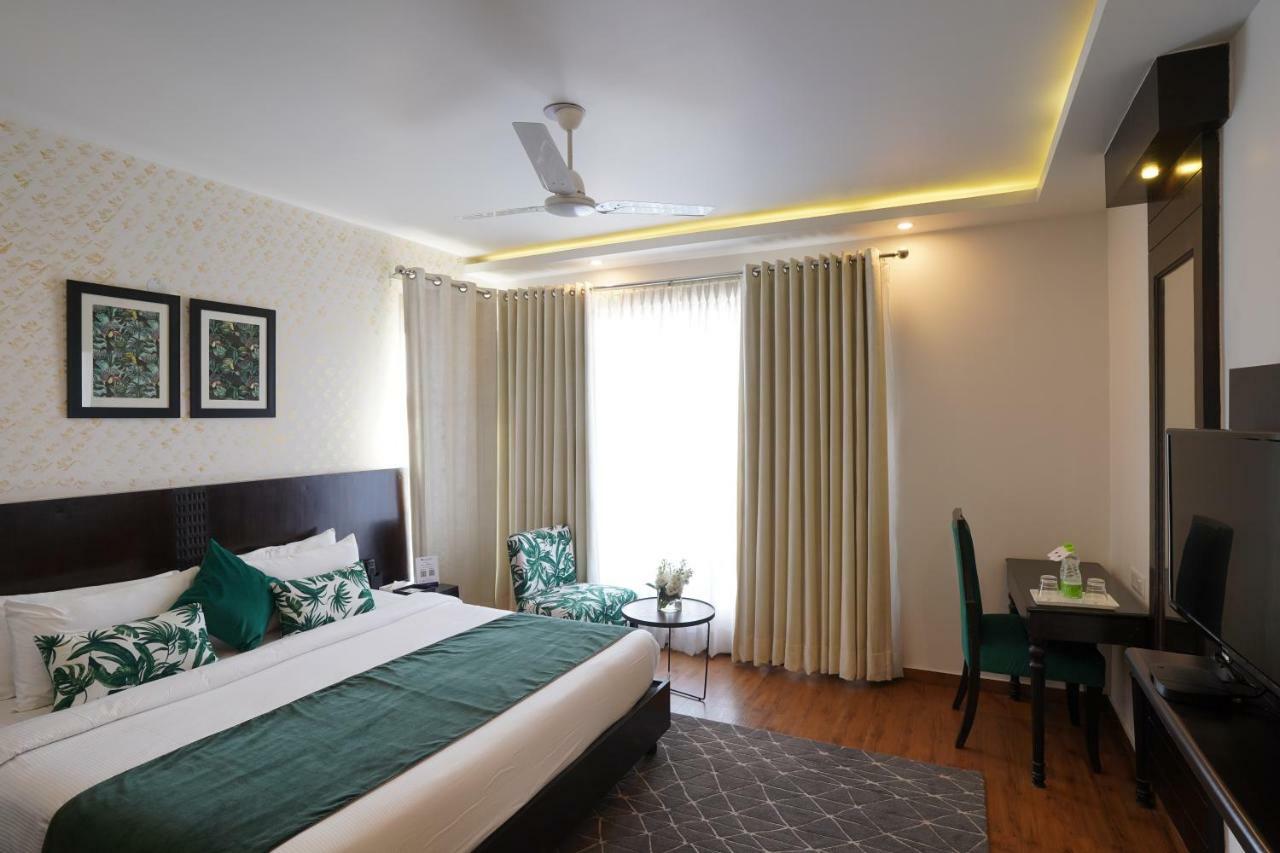 Rockland Hotel, C.R Park New Delhi Extérieur photo