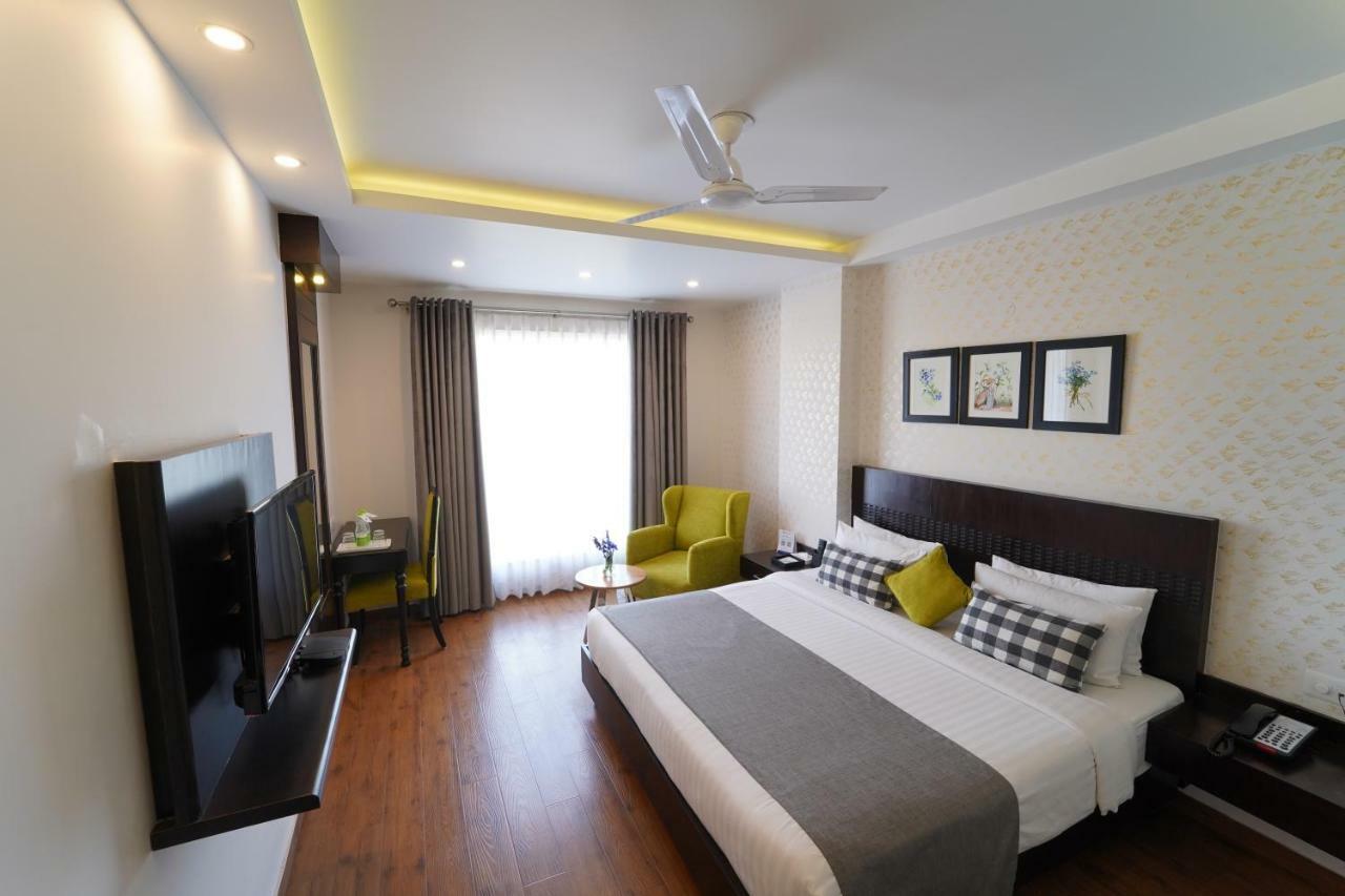 Rockland Hotel, C.R Park New Delhi Extérieur photo